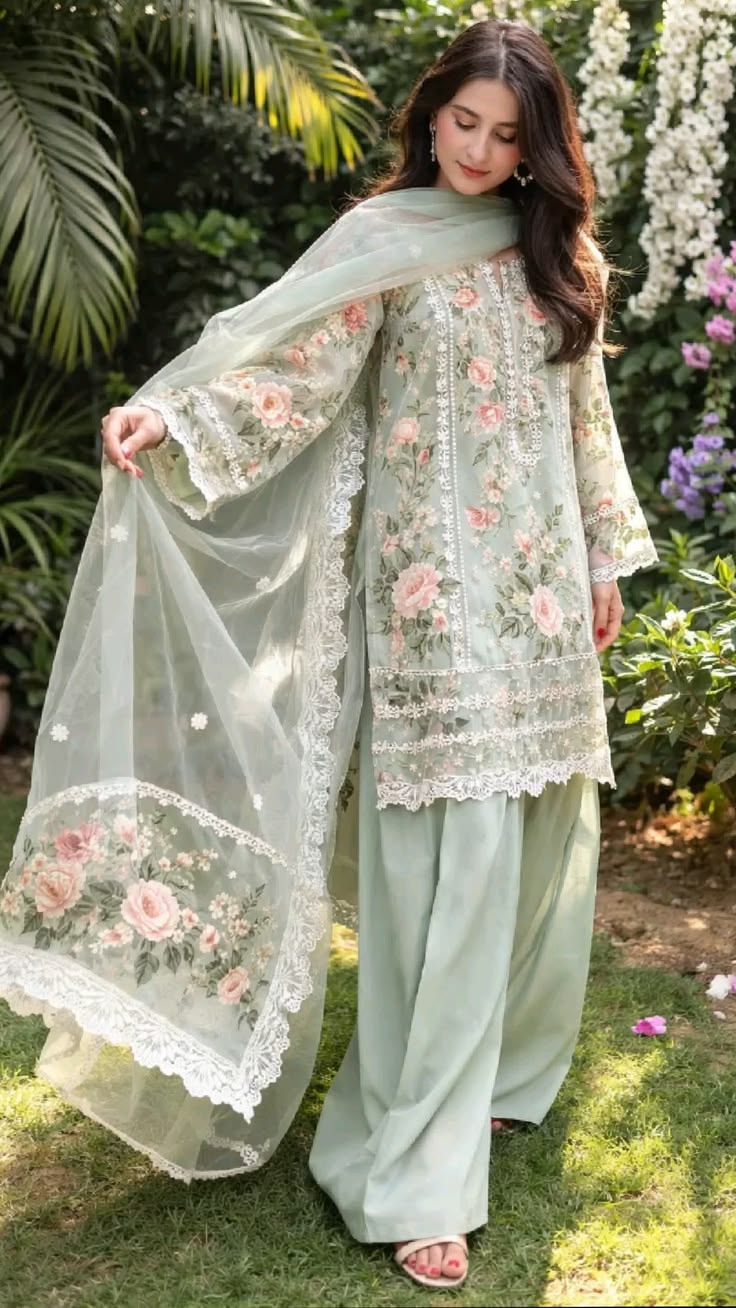 Pakistani creator showing a floral sage green kurta outfit